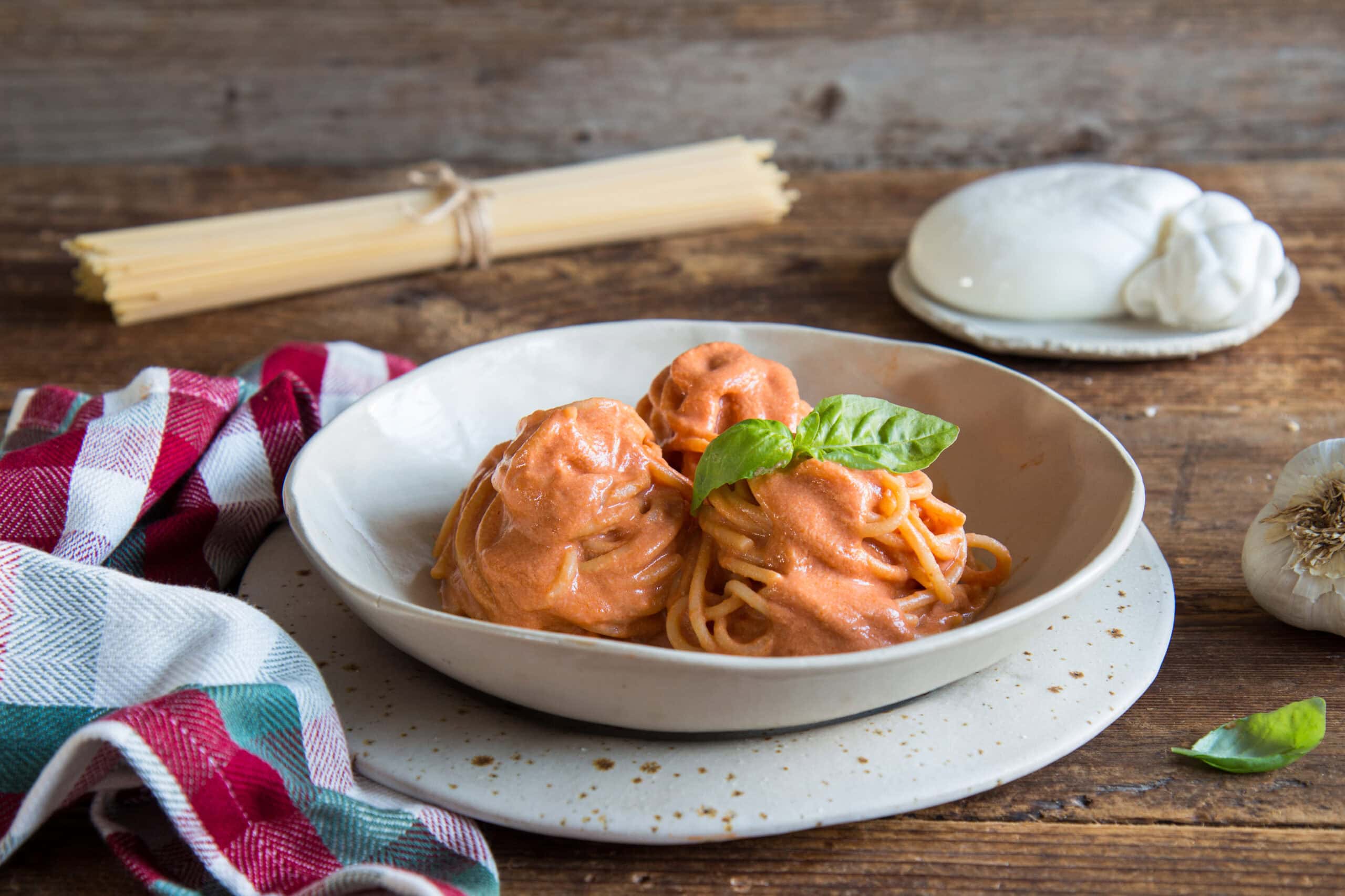 Spaghetti with tomato cream and burrata cheese