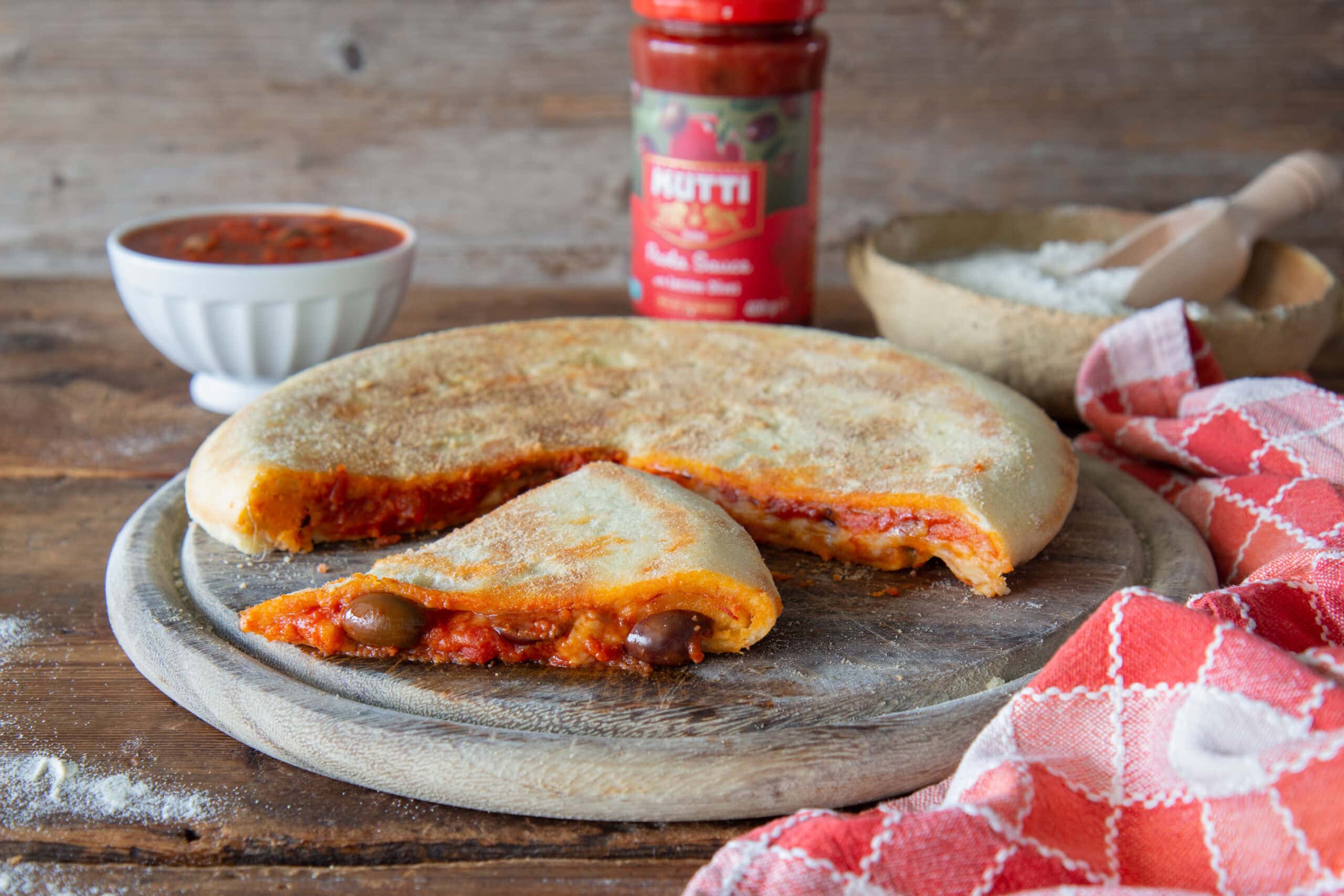 Stuffed Focaccia with Olives Tomato Sauce