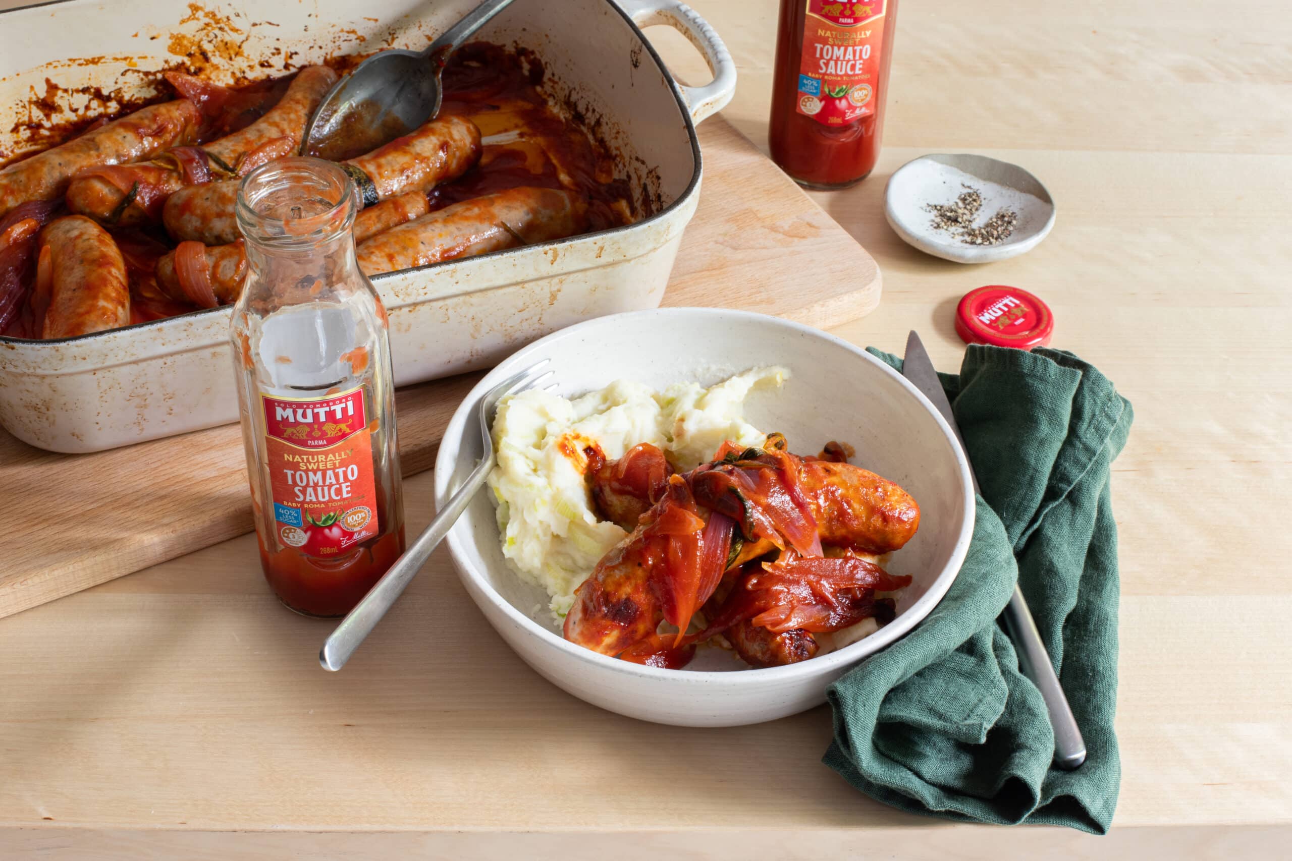 Glazed Mutti Tomato Sauce sausages with leek mash potato Glazed Mutti Tomato Sauce sausages with leek mash potato