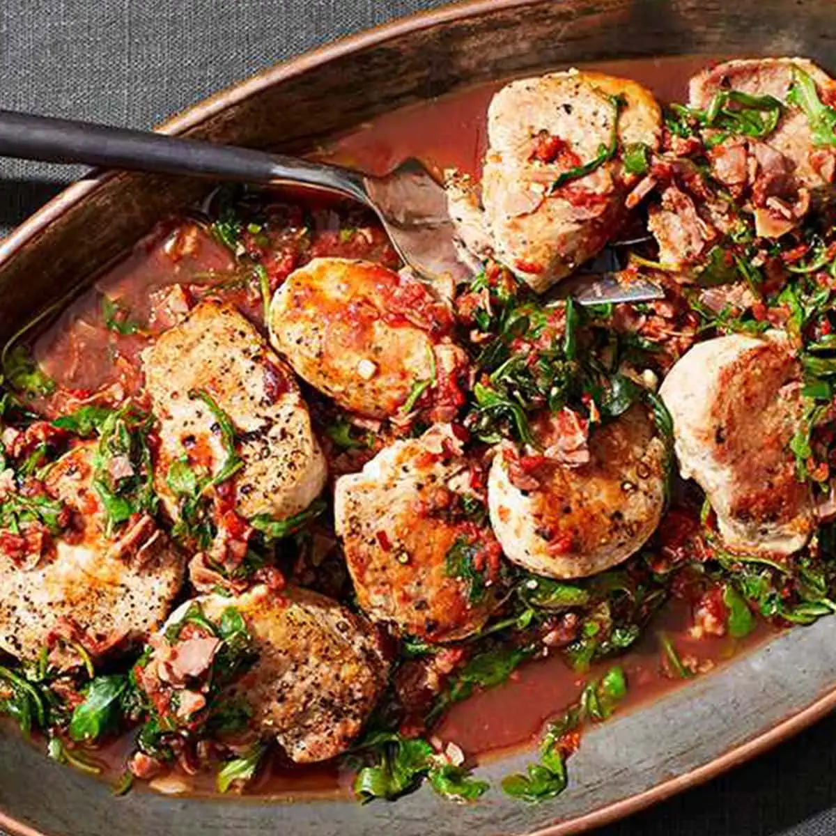 pork medallions with tomatoes prosciutto and arugula