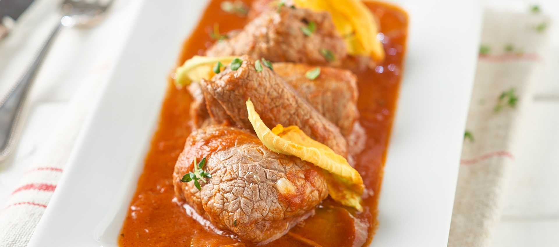 Involtini di carpaccio di manzo con fontina
