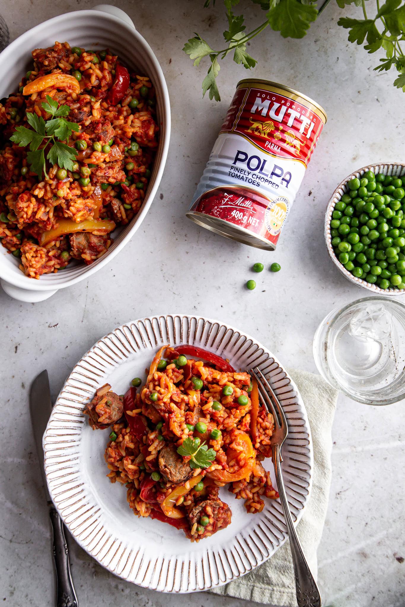 Rice with sausage, peas and peppers