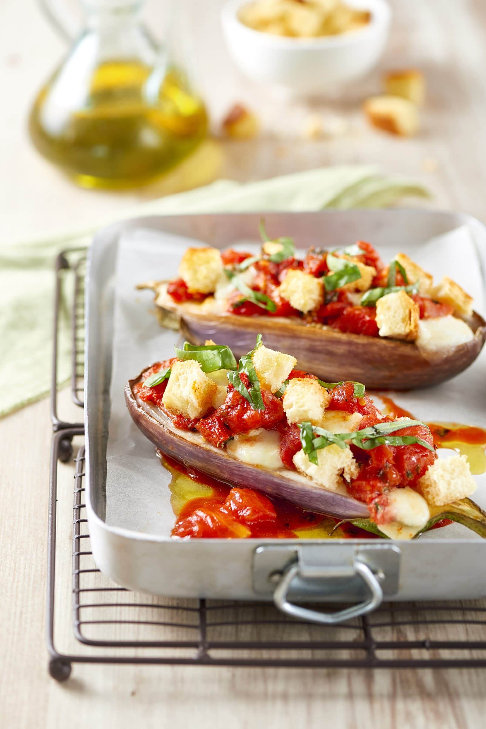 Aubergine boats with tomatoes and crunchy bread