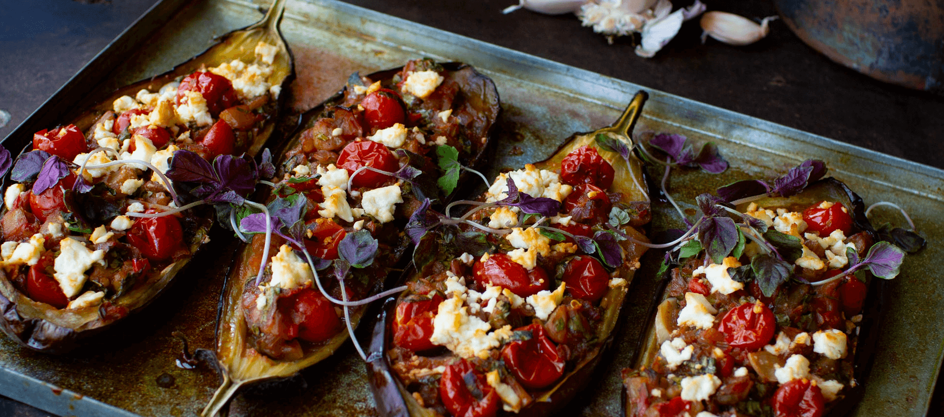 Eggplant boats with cherry tomatoes