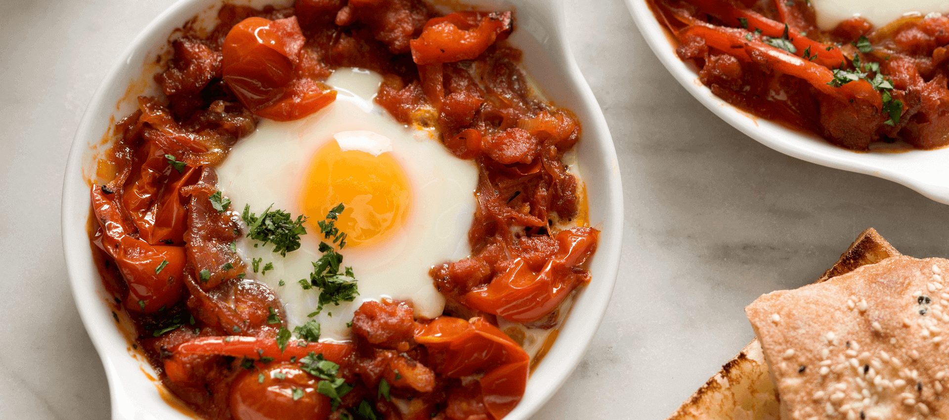Italian style baked eggs with datterini tomatoes